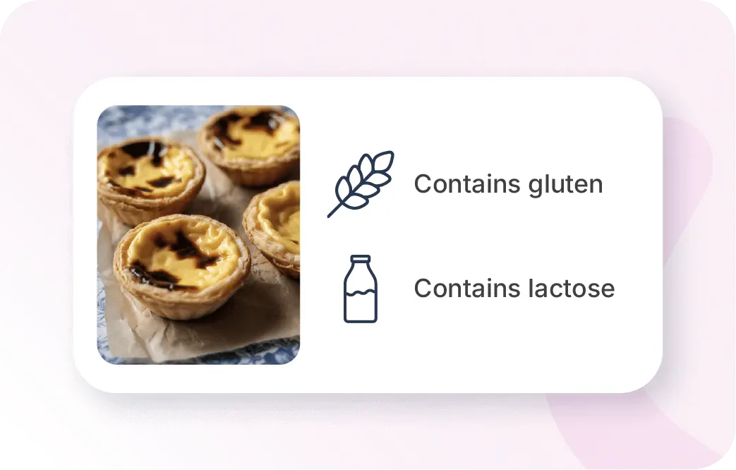 Xentral ERP for food: A digital product card featuring a photo of four custard tarts (Pastéis de Nata). To the right, two icons with text are displayed: a wheat stalk with "Contains Gluten" and a milk bottle with "Contains Lactose".