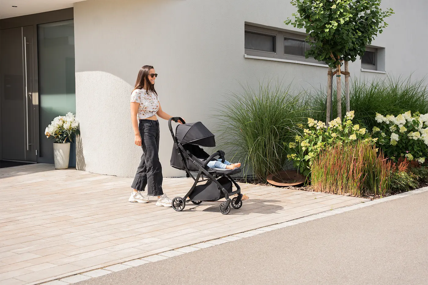 osann case study eine frau mit kinderwagen vor einem Haus